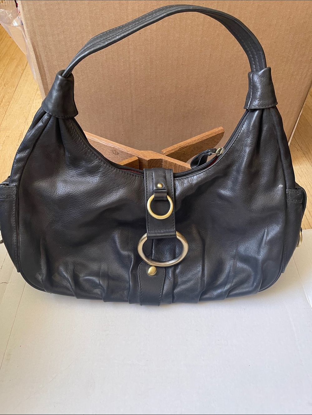 Michael Rome Black Leather Shoulder Bag with Brass Ring Accent
